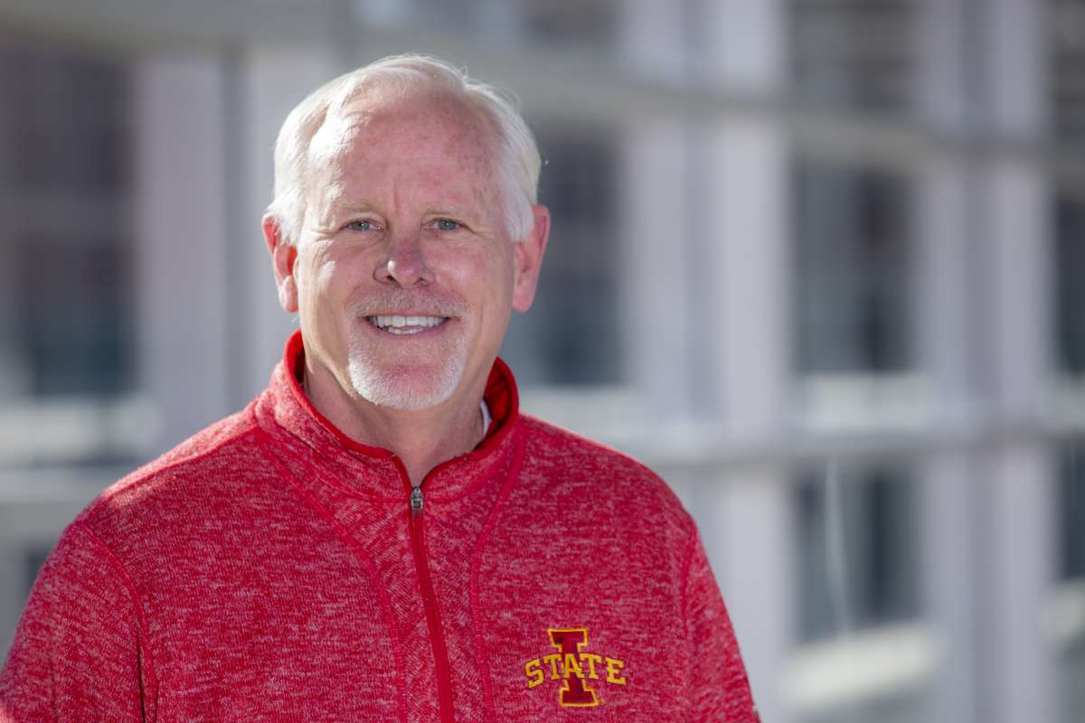 A headshot of Pete Engling wearing a red Iowa State zip up